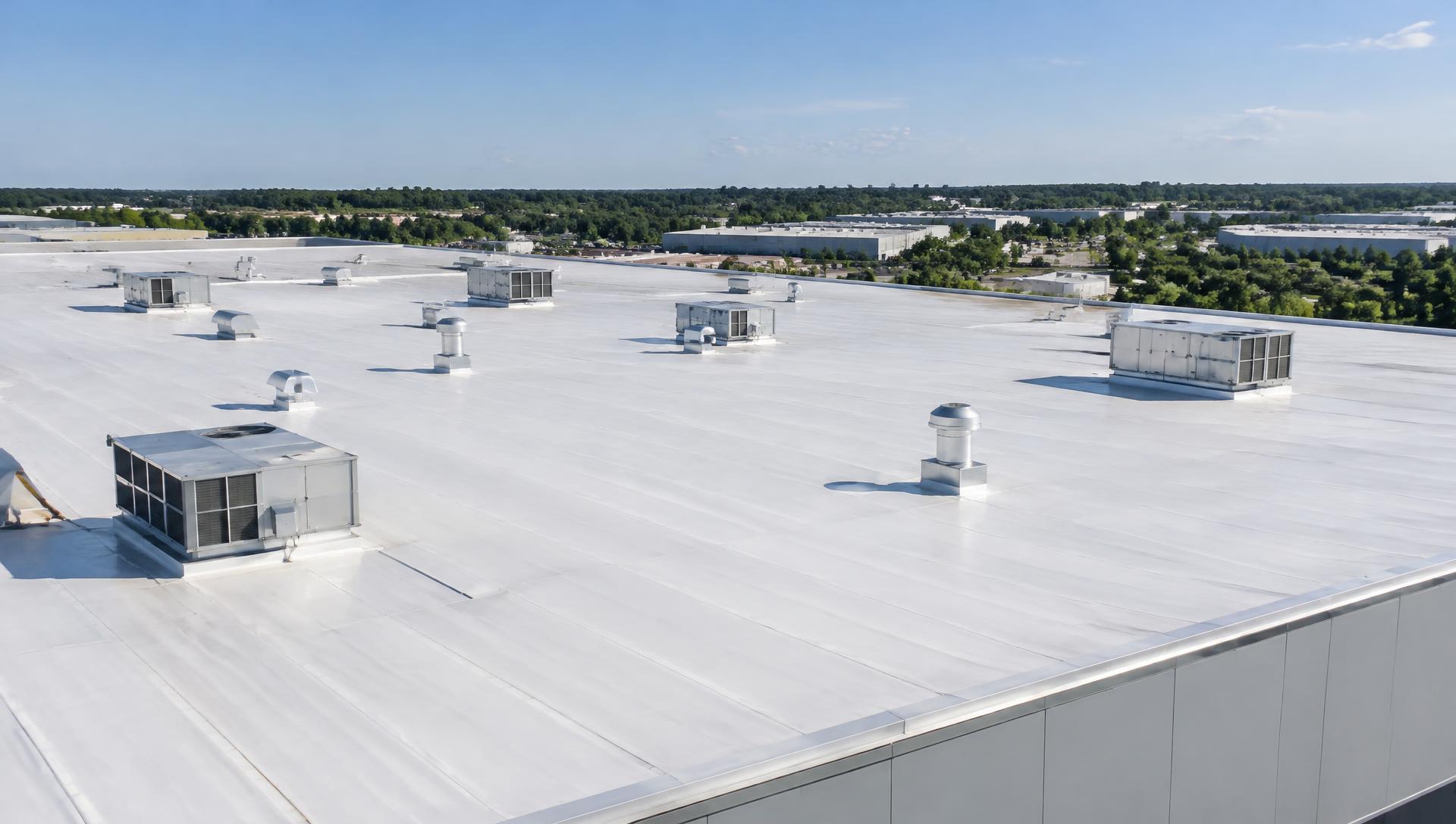 Illustrative commercial building with a white flat TPO roof